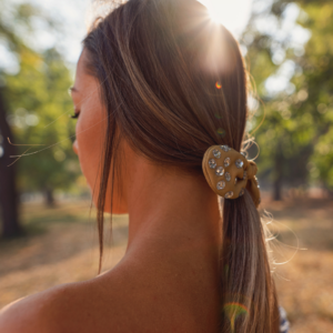 Woman with low ponytail. 