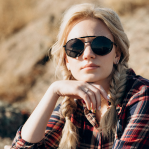 Woman with braided pigtails. 