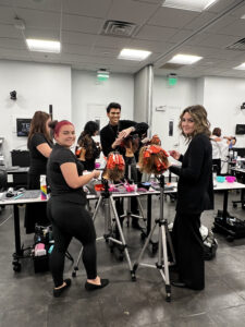 Cosmetology students at work. 